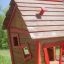 Leksakshus för barn med träpanel och röda detaljer, Anna's Playhouse.