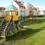 Lekplats med Rutschkana Elefanten i bostadsområde.