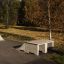 Betongramp Quarter Pipe Dubbel i en park.
