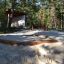 Sandlåda Natur placerad i en skogsmiljö.
