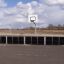 Utomhus basketbollplan med Swedbank Stadion i bakgrunden.