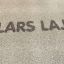Antihalkplattor med Lars Laj-logotypen.