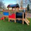 Lekplats-tåg Lok med Rutsch i en park.