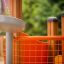 Lekplats Rubik – detaljerad orange klätternätsplattform.